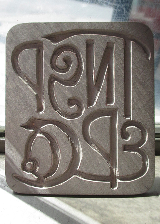 logo carving